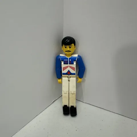 Vintage LEGO Technic Figure White Legs, White Top With Red Arrow-Type Stripes