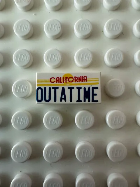 LEGO Tile 1 x 2 with Red and Dark Blue 'CALIFORNIA OUTATIME' 3069pb0288