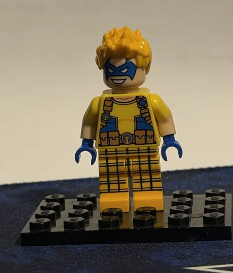 LEGO DC Trickster Minifigure Yellow Outfit, Blue Mask & Hands, Blond Hair