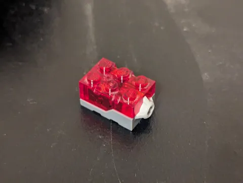 Tested/working Lego dark grey light brick with red light part 54930c01