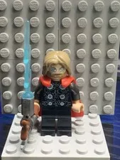 Lego Thor Minifigure With Stormbreaker Axe And Squishy Cape From 76322