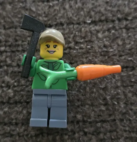 LEGO Minifigure Green Torso Gray Legs Tan Hair With Carrot Black Ax