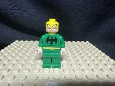 LEGO Iron Fist Minifigure Green Suit with Yellow Mask  Feet Have Damage