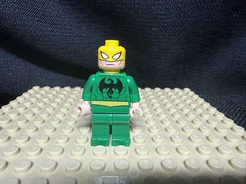 LEGO Iron Fist Minifigure Green Suit with Yellow Mask  Feet Have Damage