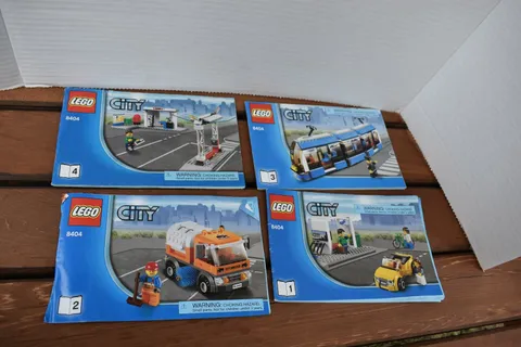 LEGO CITY BOOKS #8404, BOOKS 1 TO 4,  PRE-OWNED, NO BRICKS OR PEOPLE, B18