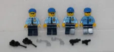 Lego Minifigures 4 Policemen, 2 handcuffs, 2 guns and 2 walkie talkies