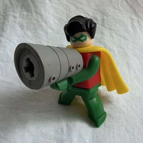 LEGO Robin Minifigure Figure with Yellow Cape & Launcher Gray Accessory Plastic