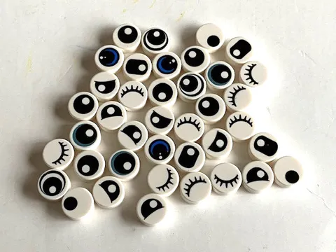 LEGO White 1X1 Round Printed Tiles: Assorted Eyes / Eyelash Patterns - Lot of 39