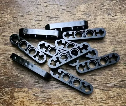 LEGO Black Technic, Liftarm Thin 1 x 4 - Axle Holes. QTY 10. Part No. 32449.