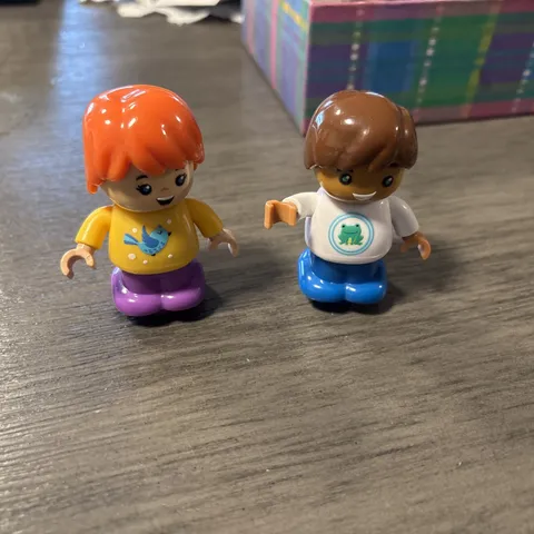 Lego Duplo Girl And Boy Figure - Blue Bird on Yellow Shirt, Frog On Shirt