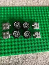 LEGO®  Tires, Wheels, and Axles. Four (4) Each