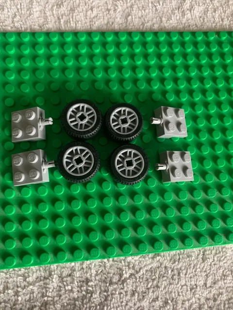 LEGO®  Tires, Wheels, and Axles. Four (4) Each