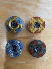 Lego ninjago spinners Blue, red, gold, black. Used Not complete