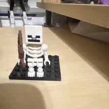 Lego Minecraft skeleton with bow slight scratches on head