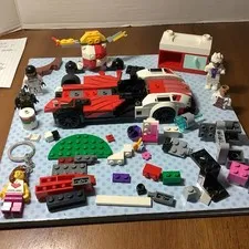 LEGO Mixed Lot - partial Porsche car, partial Porsche Porsche driver other misc