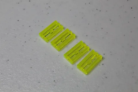 LEGO Parts - Trans-Yellow Tile 1 x 2 Grille - No 2412b - QTY 4