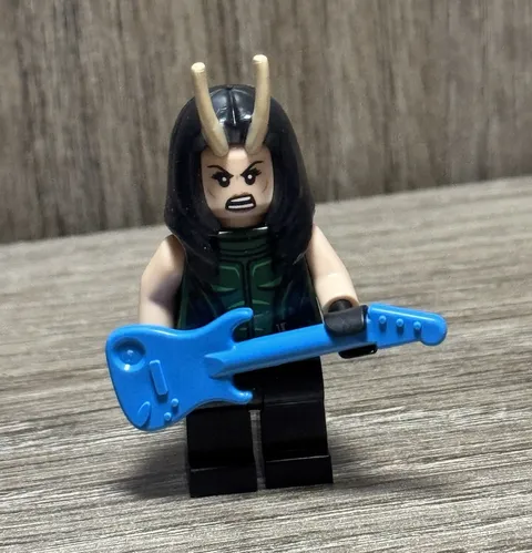 LEGO Minifigures Female Minifigure Long Black Hair Horns w/ Blue Guitar