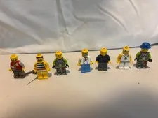 lego lot 9 WARNING PIRATE HAS CRACK ON ARM (AS SEEN IN PHOTO)