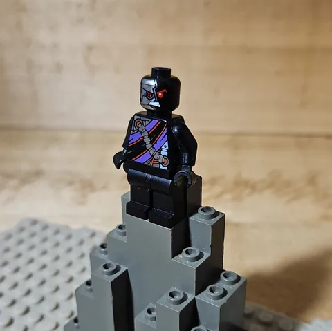 LEGO Plastic Minifigure Black Outfit w/ Cybernetic Face, Helmet Head & Red Eyes