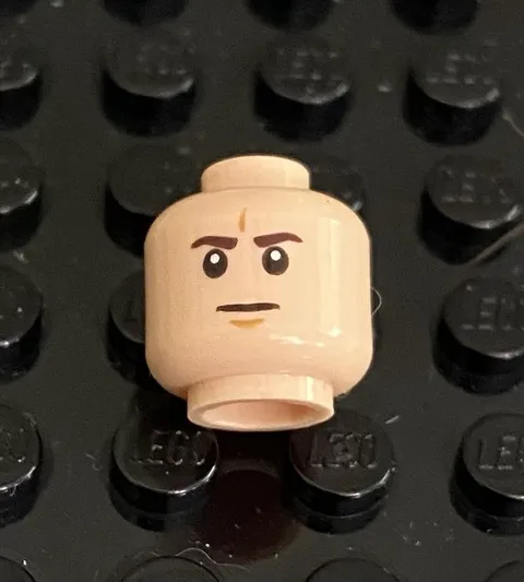LEGO Light Nougat Head, Brown Eyebrows, Flat Grin, Dimple Between Eyes & On Chin