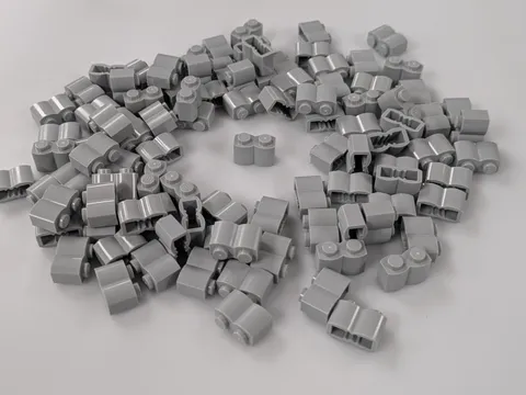 Lego x100 New Light Bluish Gray Brick, Modified 1 x 2 with Log Profile  # 30136