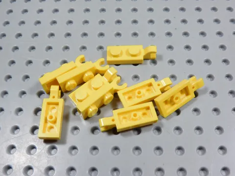 LEGO Lot of 9 Yellow 1x2 Modified Plates w/ Clip on End BK