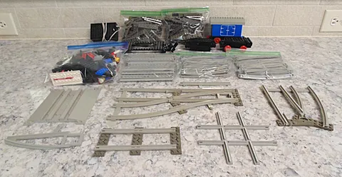 Hugh Vintage Lot of LEGO Train Tracks, Train Battery, Box Car, Misc. Train Parts