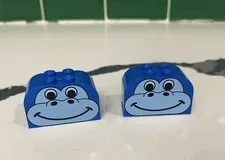 4744, 2 Pc  Lego curved slope 4 x 2 x 2  four studs Blue Gorilla/Animal