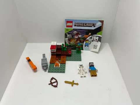 LEGO Minecraft: The Taiga Adventure (21162) with minifigures and manual. No box