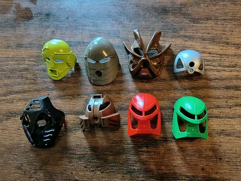 Vintage LEGO Bionicle Kanohi Mask Lot - 8 Masks (Hau, Kraahkan, Ruru, Miru)