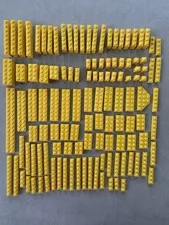 Lot of 125 Assorted Yellow Lego Bricks, Plates, and Tiles