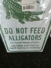 Do Not Feed The Gators Aluminum Green And White Sign With Logo Gator Logo