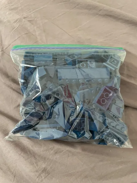 1/2 lb bag of random navy blue lego pieces - used pieces - random pieces