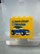 LEGO collector's brick special brick 2x4x3 yellow Hyundai driving school 2013