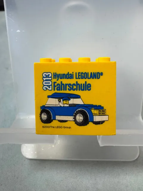 LEGO collector's brick special brick 2x4x3 yellow Hyundai driving school 2013