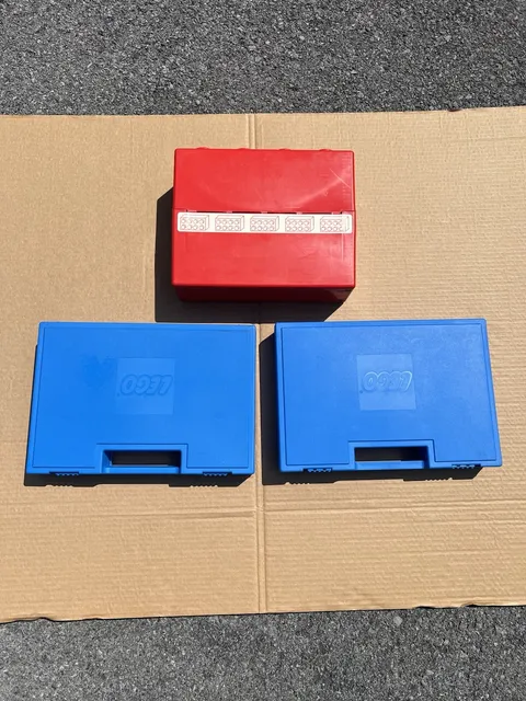 Two Lego Sets And Lego Manual Holder