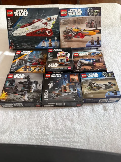 new, sealed LEGO Star Wars lot, featuring popular characters and vehicles