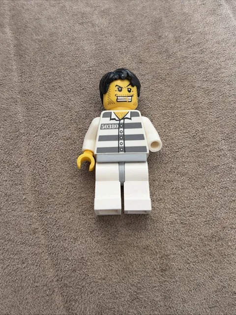 The LEGO City Bandit Minifigure Criminal Police Station Missing Hand