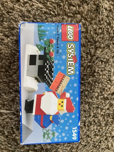 This Vintage LEGO System #1549 Santa and Chimney Set with Instructions