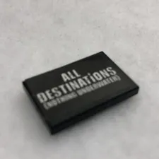 LEGO 26603pb173 Black Tile 2 x 3 W/ White 'ALL DESTINATiONS’ Pattern (x1)