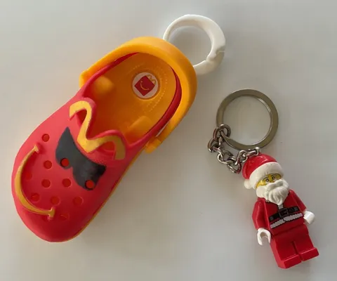 Lego Santa Claus Keychain and McDonald’s Crocs Keychain Lot of 2 Keychains