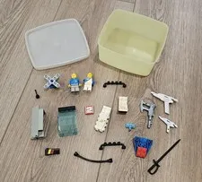 Lot of 1990s Legos, Minifigs, MMPR Accessories in Vintage Tupperware Dirty USED