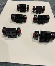 Lego 2x2 Black Smooth Wheel Metal Axel Red Rim 3137 Lot Vintage