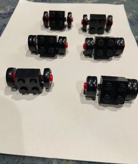 Lego 2x2 Black Smooth Wheel Metal Axel Red Rim 3137 Lot Vintage