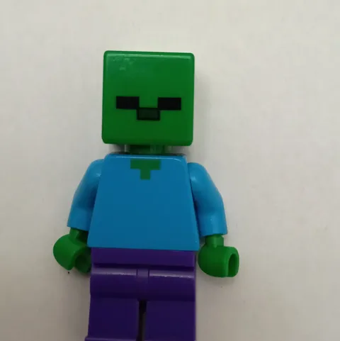 LEGO Minecraft Zombie Minifigure w/ Green Head, Blue Torso & Purple Legs