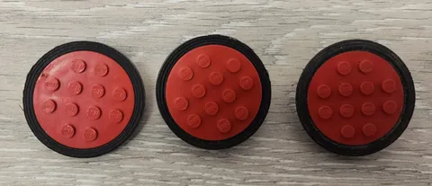 Lego 715c01 Wheel with 12 Studs and Metal Axle Cam Black Tire Smooth Lot Of 3