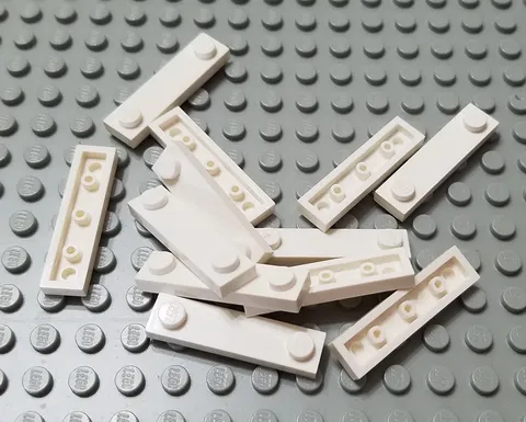 LEGO Lot of 12 White 1x4 Edge Stud Plate Pieces