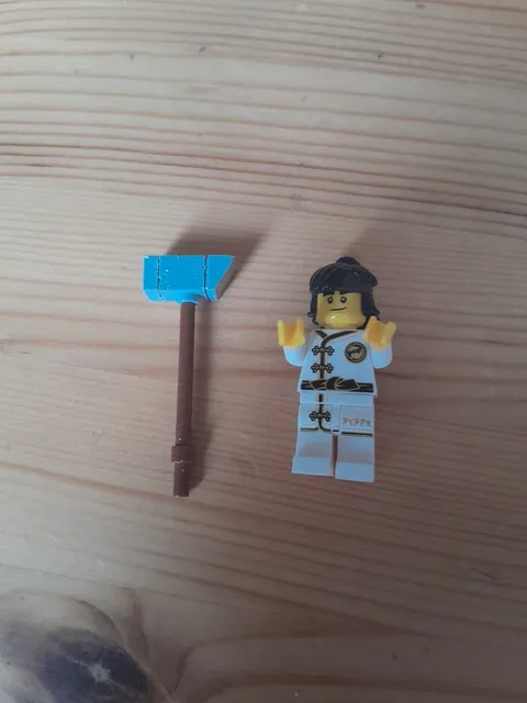 LEGO Ninjago Cole minifigure in his White Wu-Cru Training Gi with a hammer