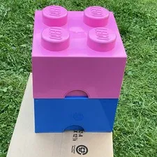 2 Lego 4-studs storage brick, one pink brick and one blue brick