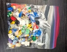 LEGO and bricks people parts lot with arms, legs, heads, shirts